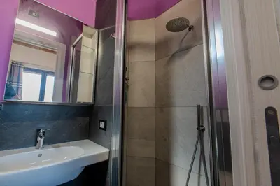 a bathroom with a sink and a shower at Villa Ginevra in Santa Ninfa