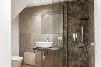 a living room with a couch and a table at Eleven Luxury Suite in Palermo