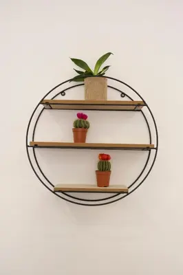 a metal and wood shelf with potted plants on it at Maison Zisa - Proppro SRL - Palermo in Palermo
