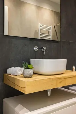 a bathroom with a sink and a mirror at Luxury Jacuzzi Villa Diana in Palermo
