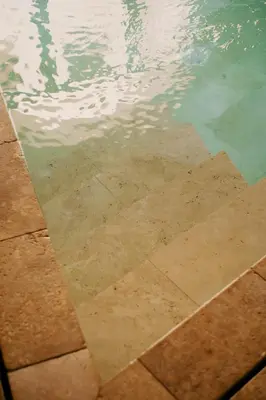 a pool of water with the reflection of the sky at Spasimo Hôtellerie in Palermo