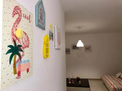 a room with a wall with drawings on it at Casa Vacanze Filippa in Balestrate