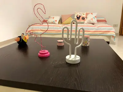 a table with a fork and two cups on it at Casa Vacanze Filippa in Balestrate