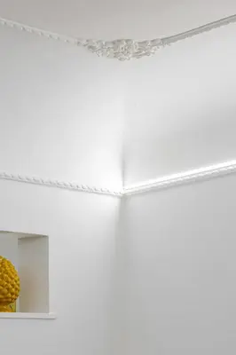 a room with white ceilings and a mirror at Stella del Sud in Palermo