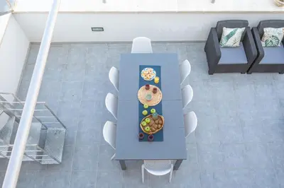 an overhead view of a table with food on it at La Dolce Vista - Magaggiari in Terrasini