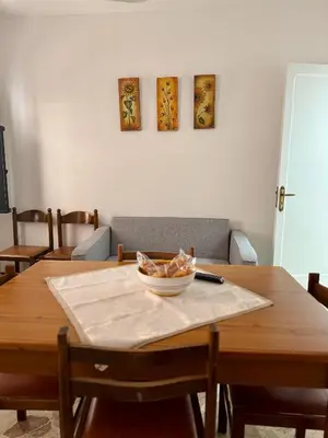 a dining room table with a bowl of food on it at Casa Katarina in Calatafimi