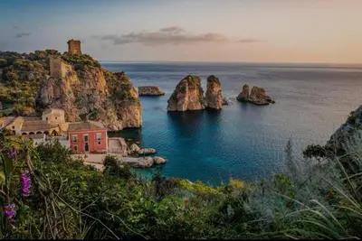 a view of a bay with rocks in the water at Casa Katarina in Calatafimi