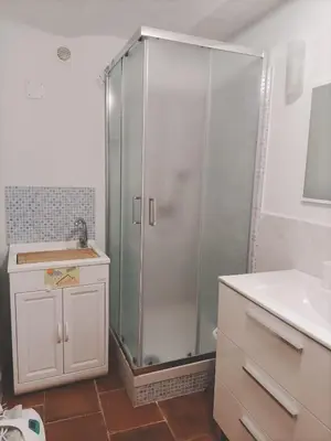a bathroom with a shower and a sink at La casa del cocchiere in Palermo