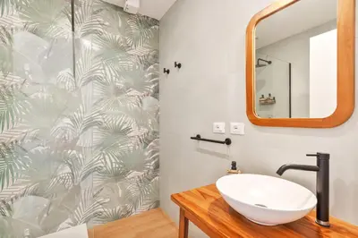 a bathroom with a sink and a mirror at Stefy's Home #Cattedrale in Palermo