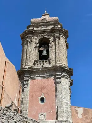 a bell tower on top of a building at ViLoKa Sicilian Guest House in Calatafimi