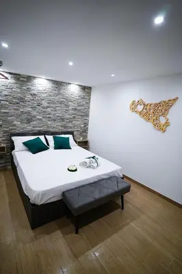 a bedroom with a bed with a cheetah on the wall at Cori ri Palermo in Palermo