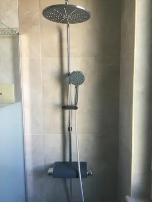 a shower with a glass door and a shower at Elegante Appartamento Palermo in Palermo