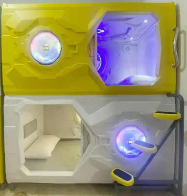 a lego playset with a room and a bed at Mermaid Space Capsule Hostel Palermo in Palermo