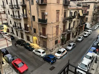 an aerial view of a city street with cars parked at Le Stanze di Magritte in Palermo