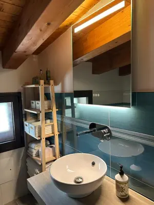 a bathroom with a sink and a mirror at Stella Del Mare in Scopello