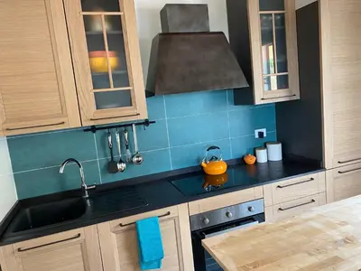 a kitchen with a sink and a stove at Stella Del Mare in Scopello