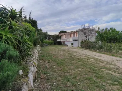 a dirt road in front of a house at Bellavista Apartments in Scopello