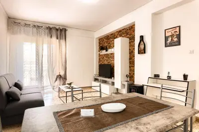 a living room with a couch and a table at Casa Vacanze La Dolce Vita in Terrasini