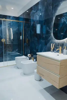 a bathroom with two sinks and two toilets at Butera 505-Luxury Suites in Bagheria