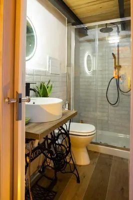 a bathroom with a sink and a toilet at Normanni Underground in Palermo