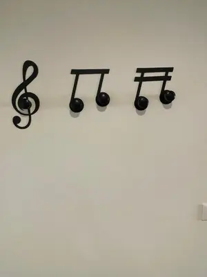 a wall with a bunch of music items on it at Soldano luxury apartment in Palermo