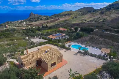 an aerial view of a house with a swimming pool at Villa Ninetta in Scopello
