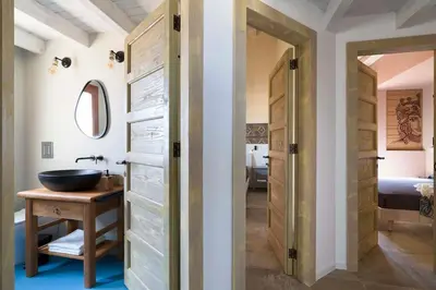 a bathroom with a sink and a mirror at Villa Mori Cala Bianca in Castellammare del Golfo