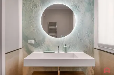 a bathroom with a white sink and a mirror at Brand New Villa with Private Heated Pool in Terrasini