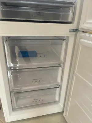 an empty refrigerator with its door open and its drawers at Sicily Holiday Home in Termini Imerese