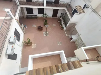 an overhead view of a courtyard in a building at Casa Vacanza Ciglietti in San Vito lo Capo
