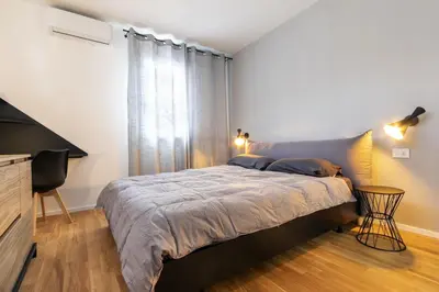a bedroom with a bed and a window at Alloro Apartment 9 in Palermo