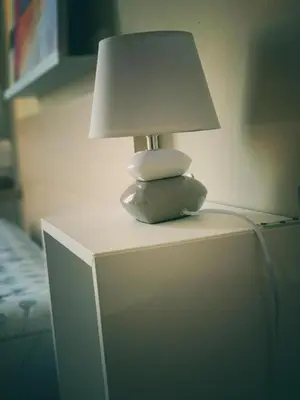 a lamp sitting on top of a white table at Marrakech Home in Palermo