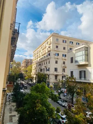 a view of a city street with a building at Politeama House in Palermo