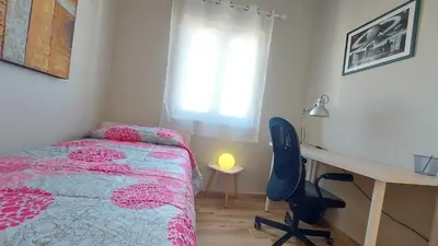 a bedroom with a desk and a bed and a desk and chair at Amedeo Suite - Palermo Centro in Palermo