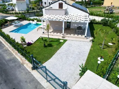 an aerial view of a house with a swimming pool at Villa Lilia - Private pool in Campofelice di Roccella