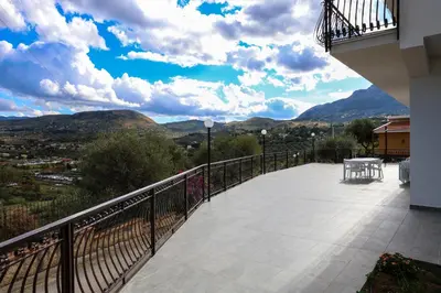 a balcony with a view of the mountains at Trabia Casa Bianca A in Mandra Capreria