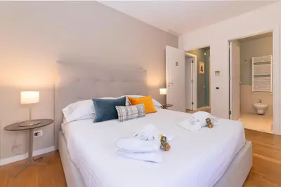 a bathroom with a bath tub and a sink at Le Sicilien - Moncada de Luna Exclusive Stay in Palermo