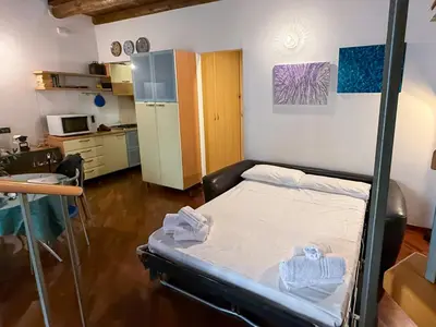 a bedroom with a bunk bed in a room at Loft in Kalsa - By Rental BeB - in Palermo