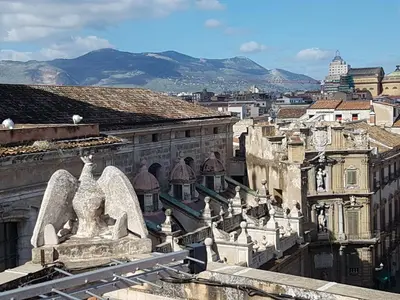 a view of a city from the roof of a building at Palazzo Viola Suite Panoramica Palermo in Palermo