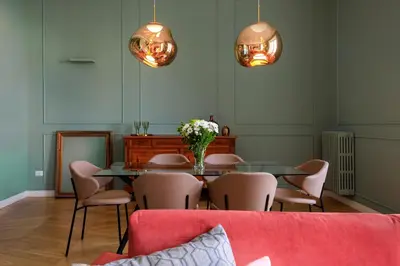 a dining room with a table and chairs at Palermo al Massimo in Palermo