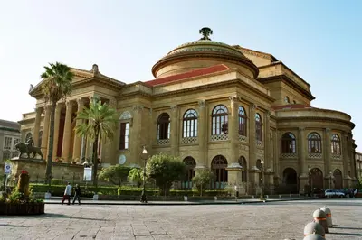 a large building with a horse in front of it at Belle Arti in Palermo