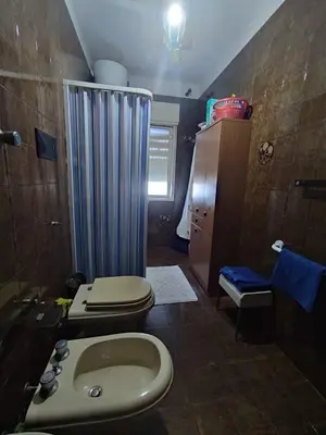a bathroom with a shower and a toilet and a sink at Casa vacanze balestrate in Balestrate