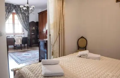 a bedroom with a bed with two towels on it at Villa Aversa in Castellammare del Golfo
