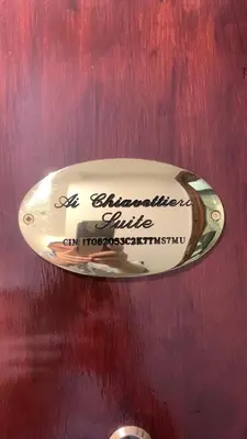 a sign on a door that says championship elite on it at Ai Chiavettieri Suite in Palermo