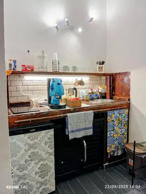 a kitchen with a sink and a blue mixer at Sicily Bed' House in Palermo