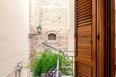 an open door to a building with a window at Casa Dolce Vita by Wonderful Italy in Palermo
