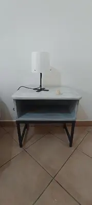 a table sitting on top of a floor at Villa Alba in Palermo