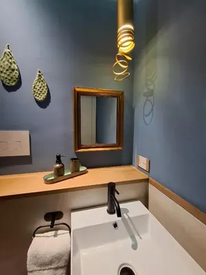 a bathroom with a sink and a mirror at MAGGESE Dimora di Charme in Palermo