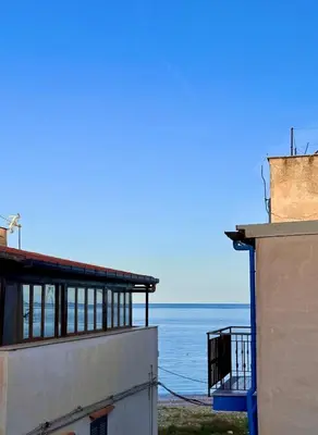 a view of the ocean from a building at FronteMare12 in Palermo
