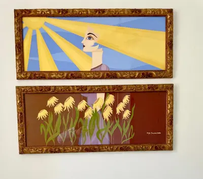 two framed paintings of a woman with flowers at Bella Kalsa in Palermo